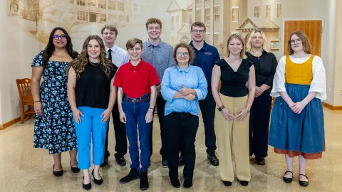 The 2026 UW-Platteville Summer Scholars pose as a group in a Markee Pioneer Student Center foyer.