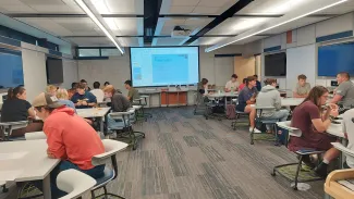 Students participate in the Bridging the Divide program in Professor Nancy Hammermeister's political science classes.