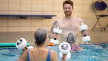 Baird Miller teaching water aerobics