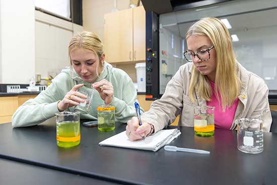 UW-Platteville biology students running experiments in lab