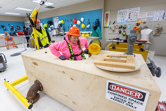 UW-Platteville students using confined space simulator