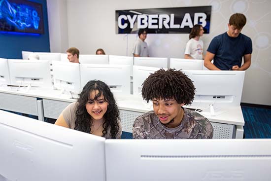 Two UW-Platteville students collaborate in computer lab