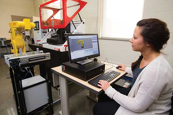 UW-Platteville student works on a computer doing 3D modeling.