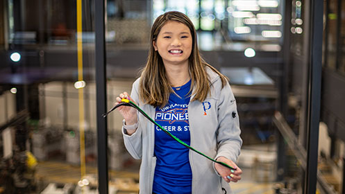 Leah Norgal, senior, mechanical engineering with her Easy Zip prototype