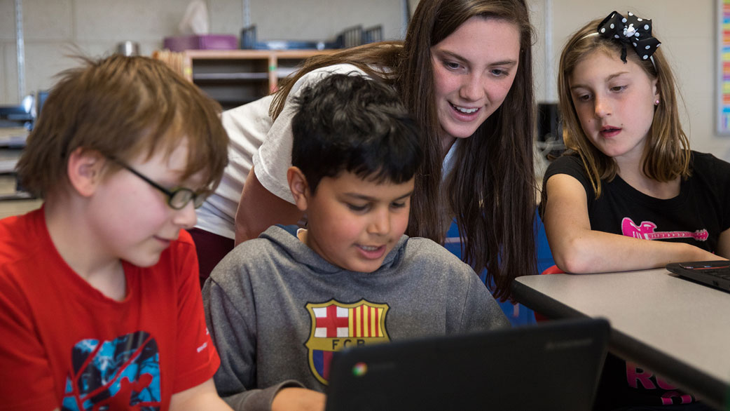 Education student teaching young children