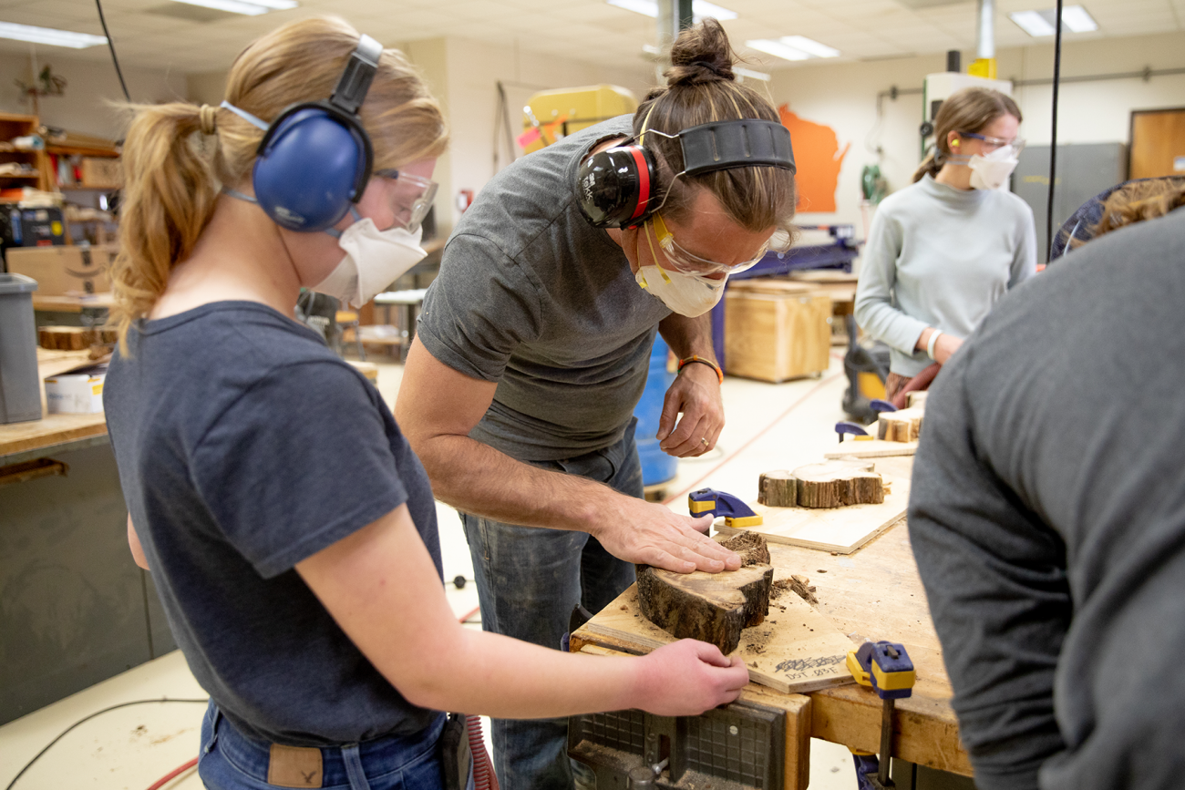 Students taking tree core sample