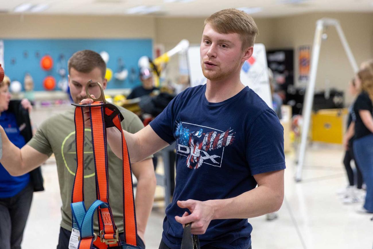 instructor explaining harness