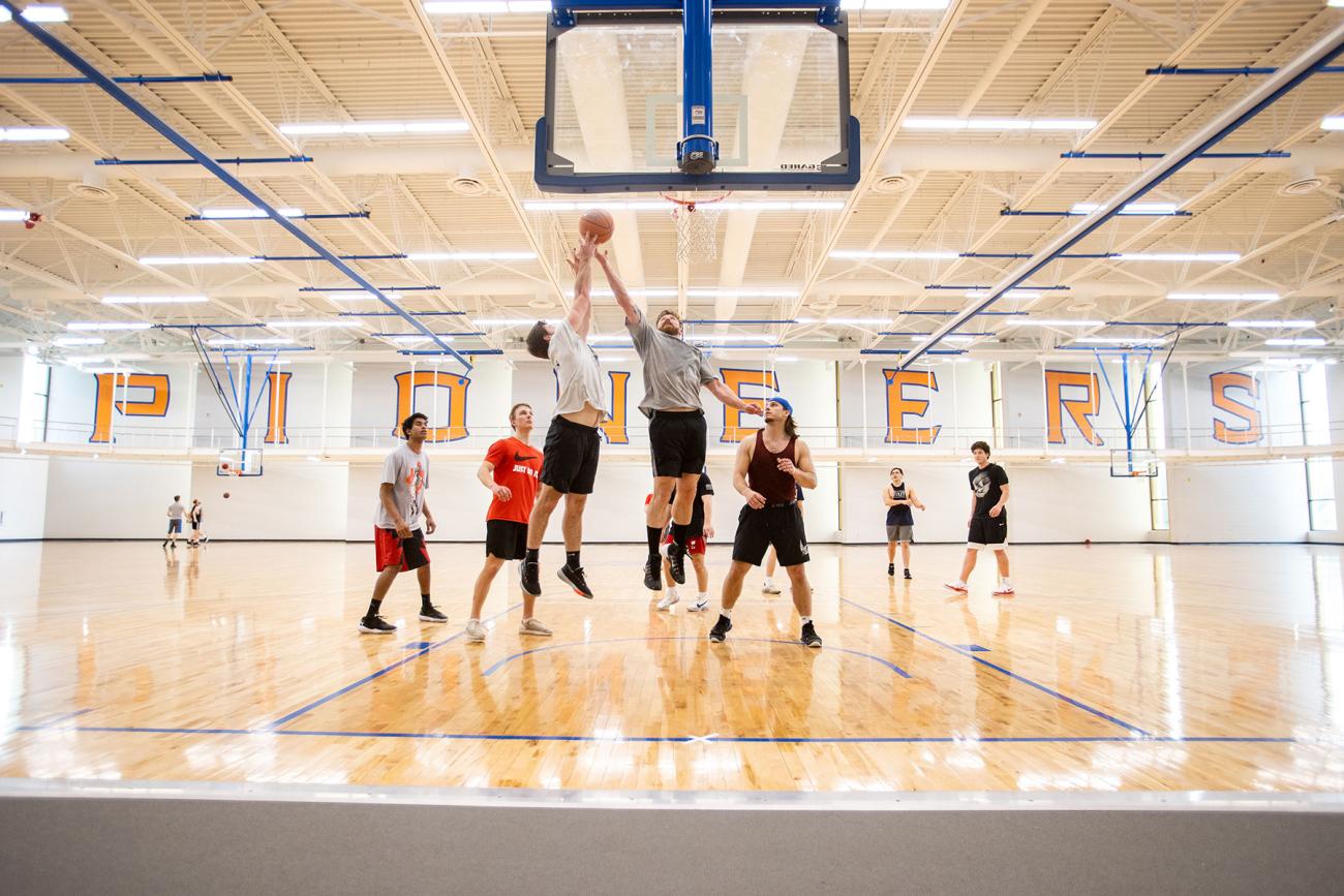 Students playing basketball