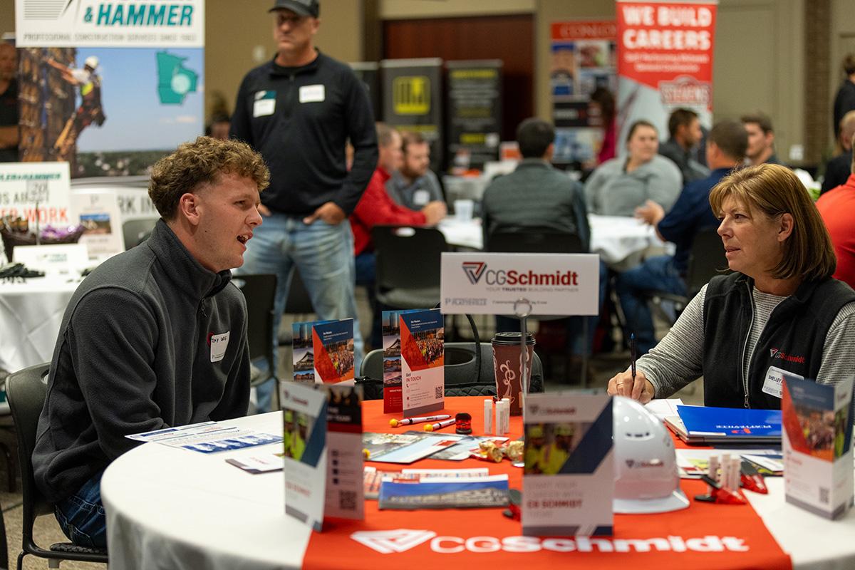 UW-Platteville student talking with employer from CG Schmidt at fall Construction Networking Event