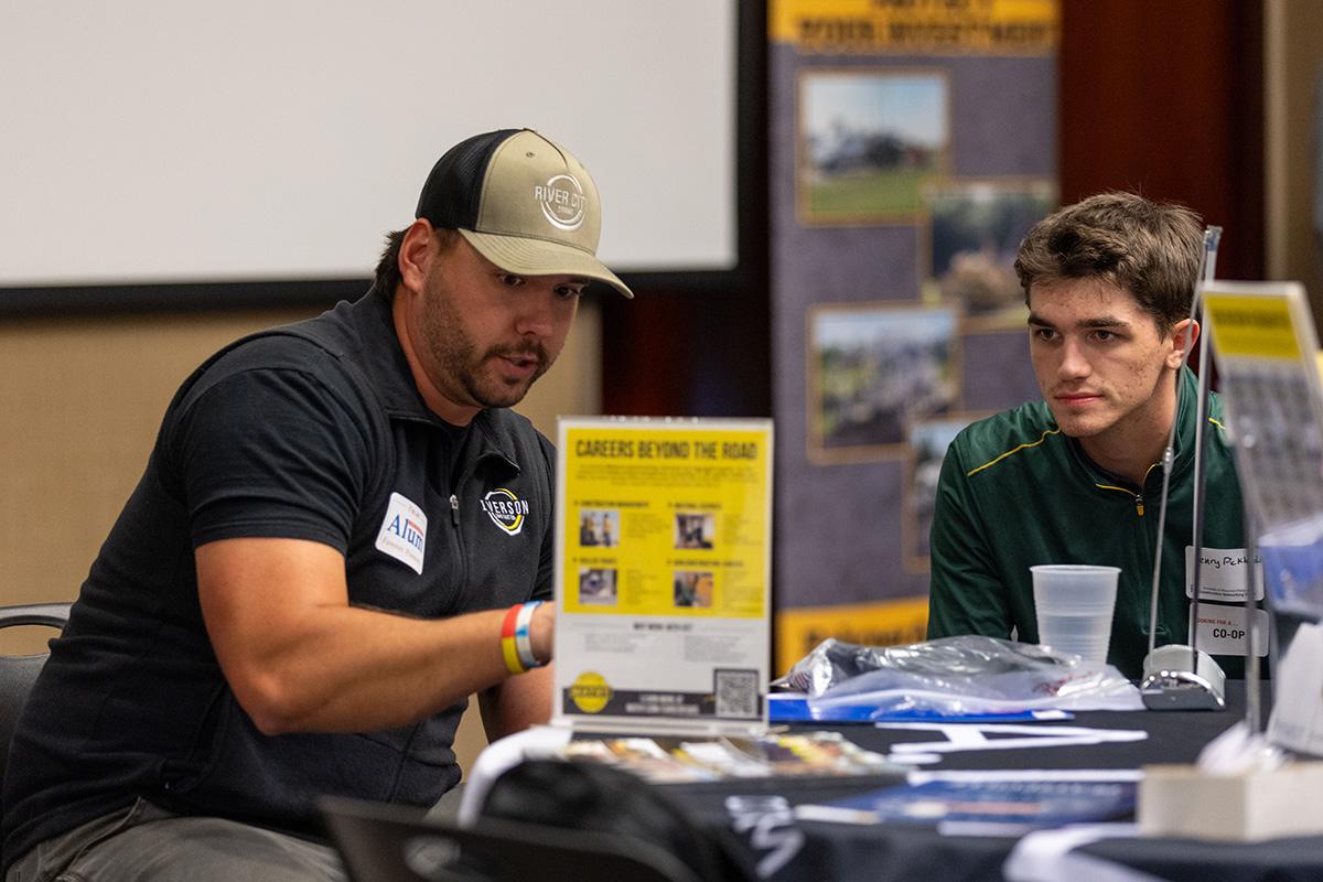 UW-Platteville student talking with employer from CG Schmidt at fall Construction Networking Event