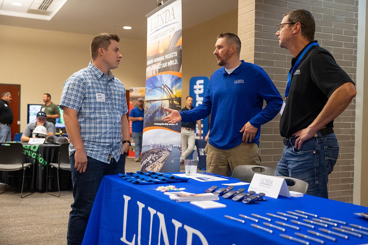 UW-Platteville student talking with employer from CG Schmidt at fall Construction Networking Event