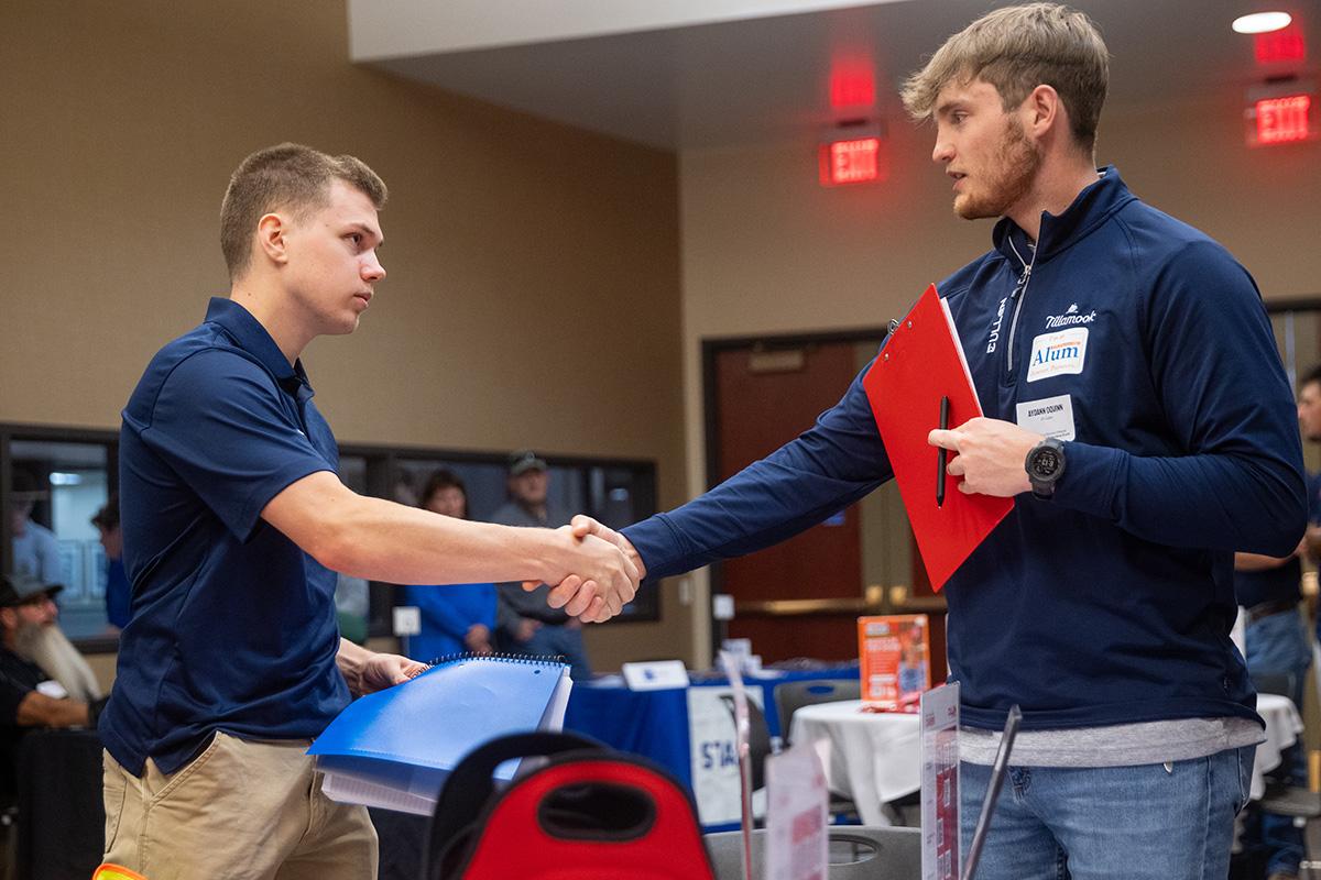 UW-Platteville student talking with employer from CG Schmidt at fall Construction Networking Event