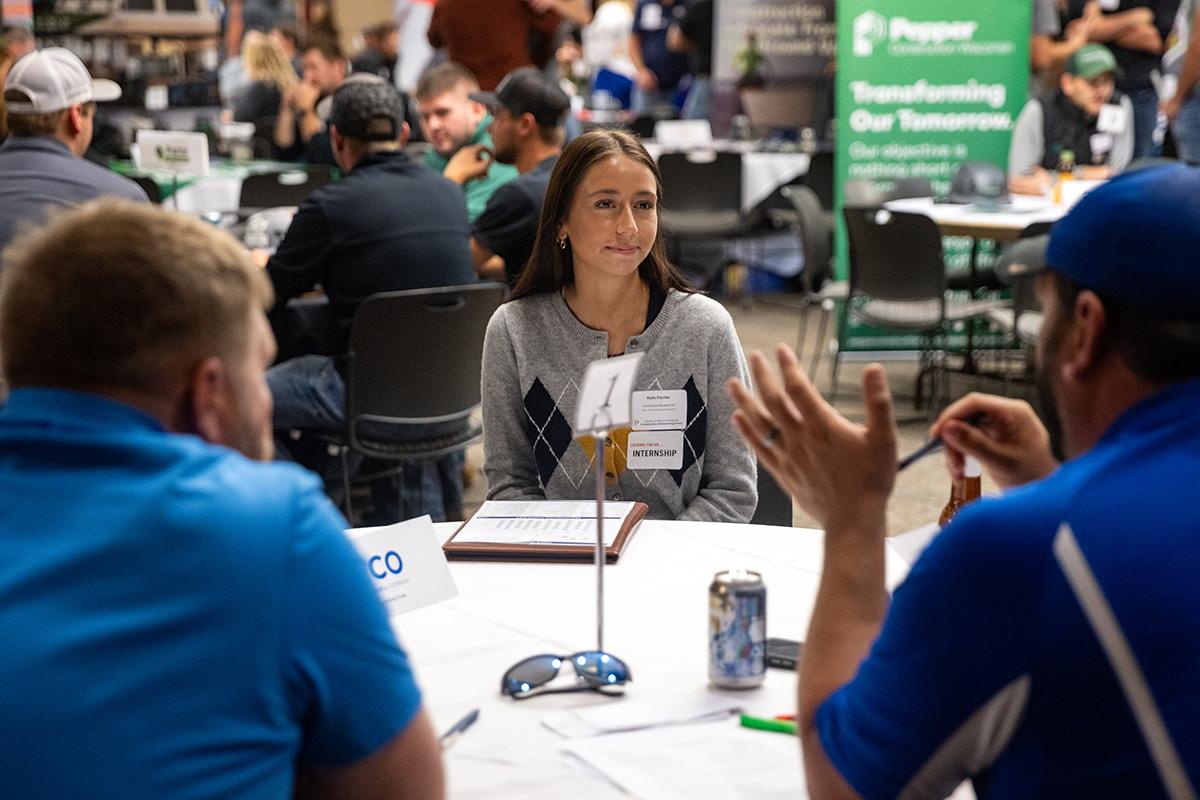 UW-Platteville student talking with employer from CG Schmidt at fall Construction Networking Event