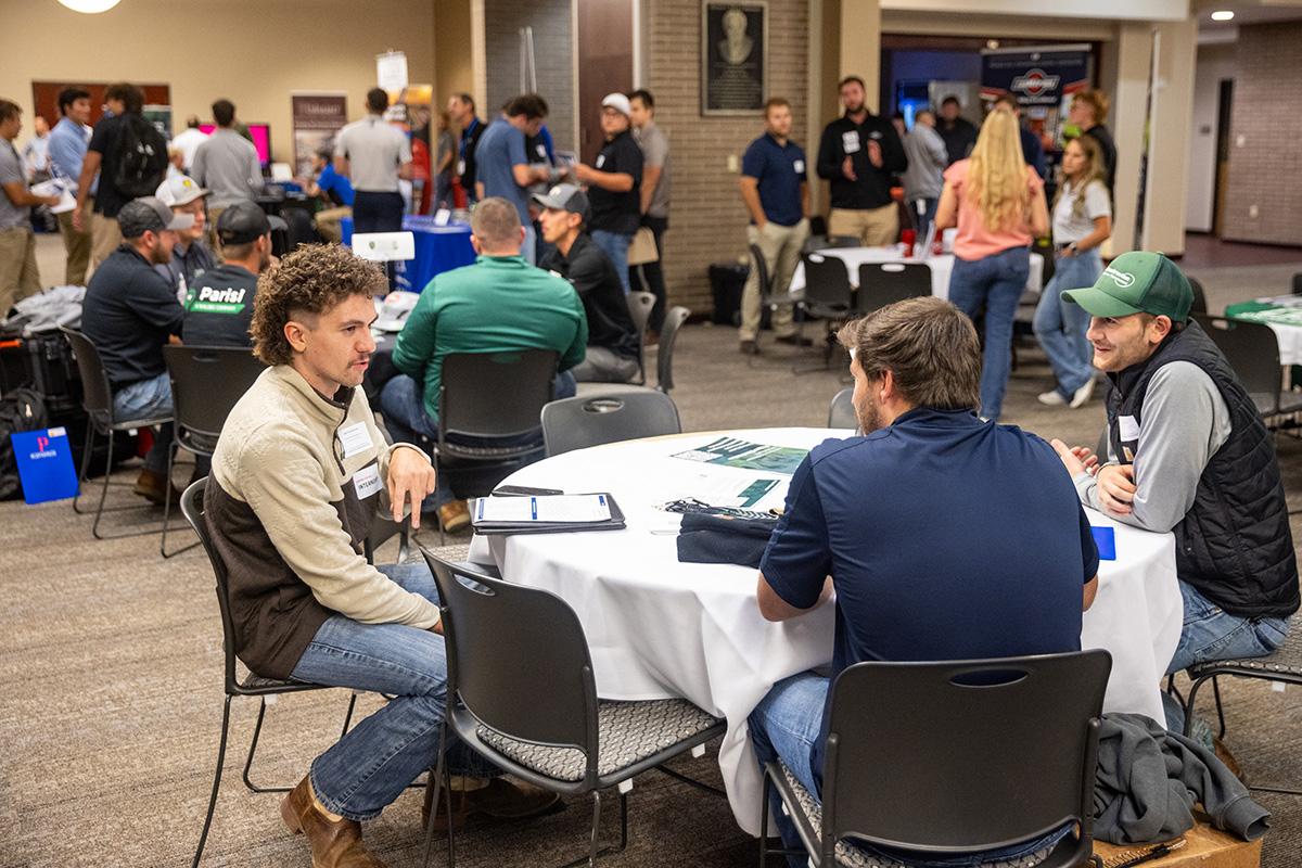 UW-Platteville student talking with employer from CG Schmidt at fall Construction Networking Event