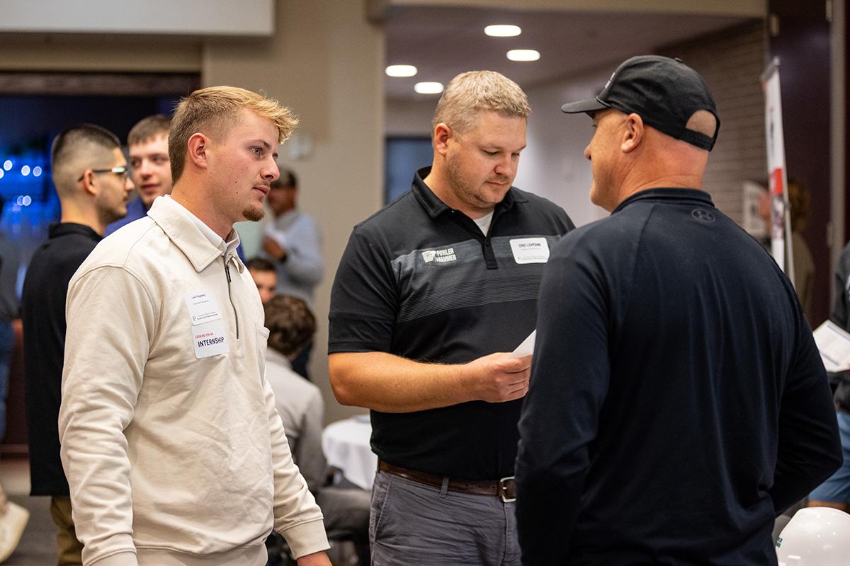 UW-Platteville student talking with employer from CG Schmidt at fall Construction Networking Event