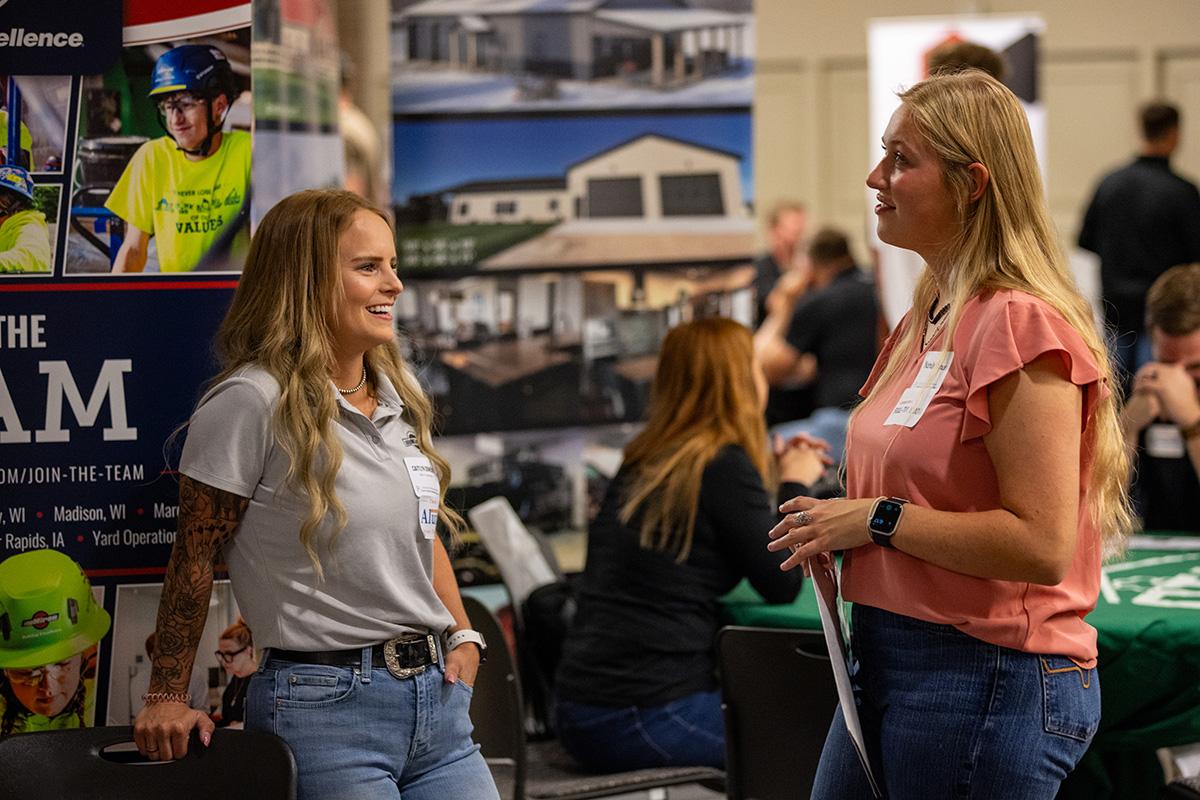 UW-Platteville student talking with employer from CG Schmidt at fall Construction Networking Event