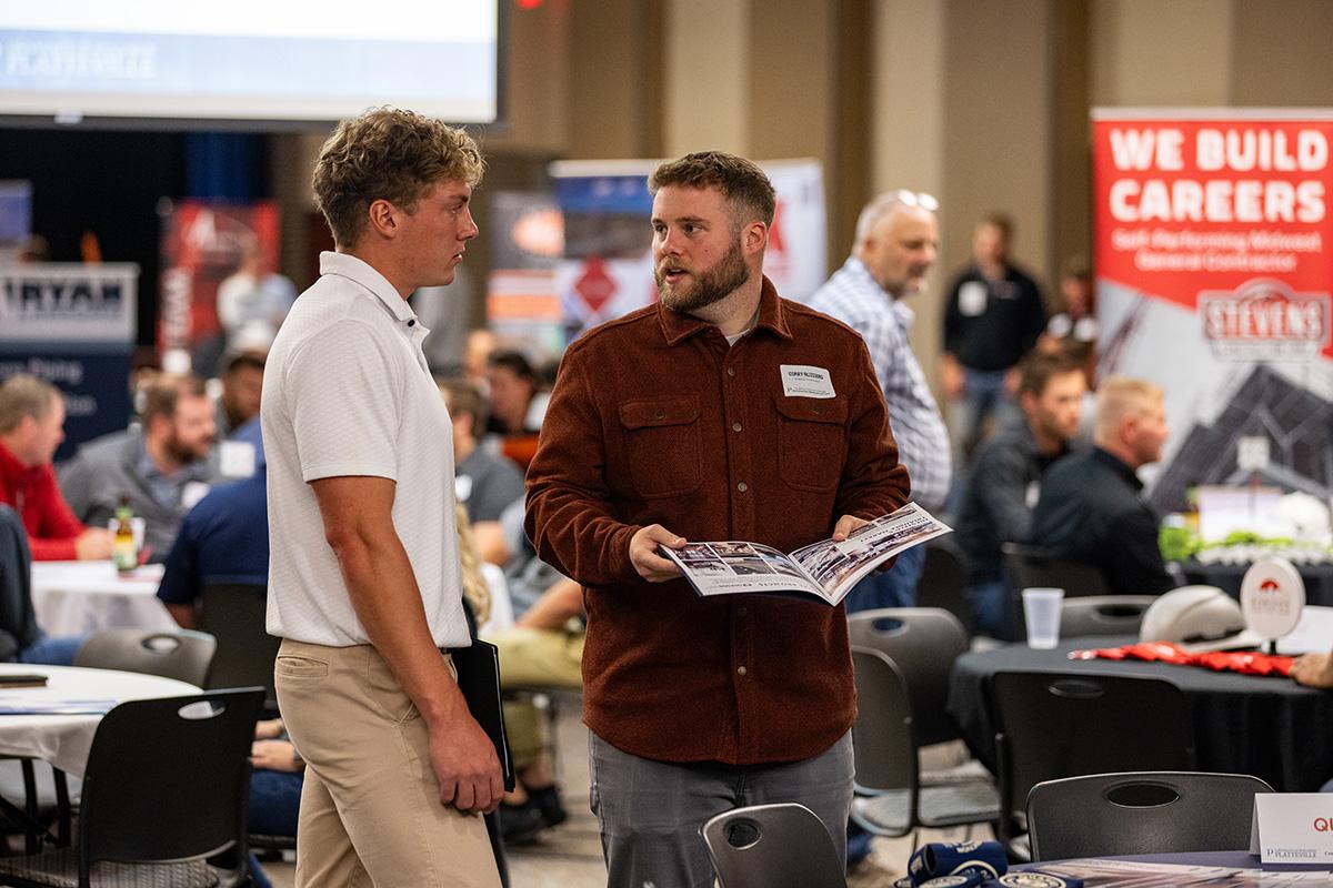 UW-Platteville student talking with employer from CG Schmidt at fall Construction Networking Event
