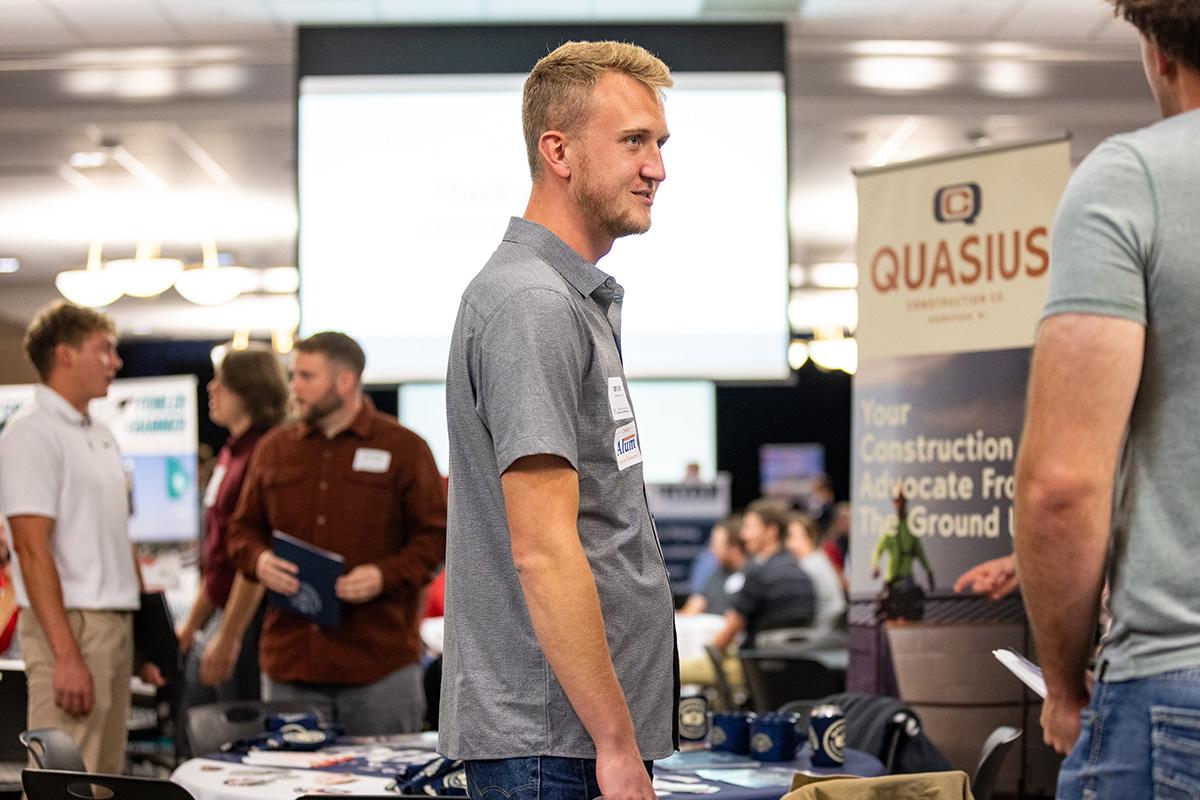 UW-Platteville student talking with employer from CG Schmidt at fall Construction Networking Event