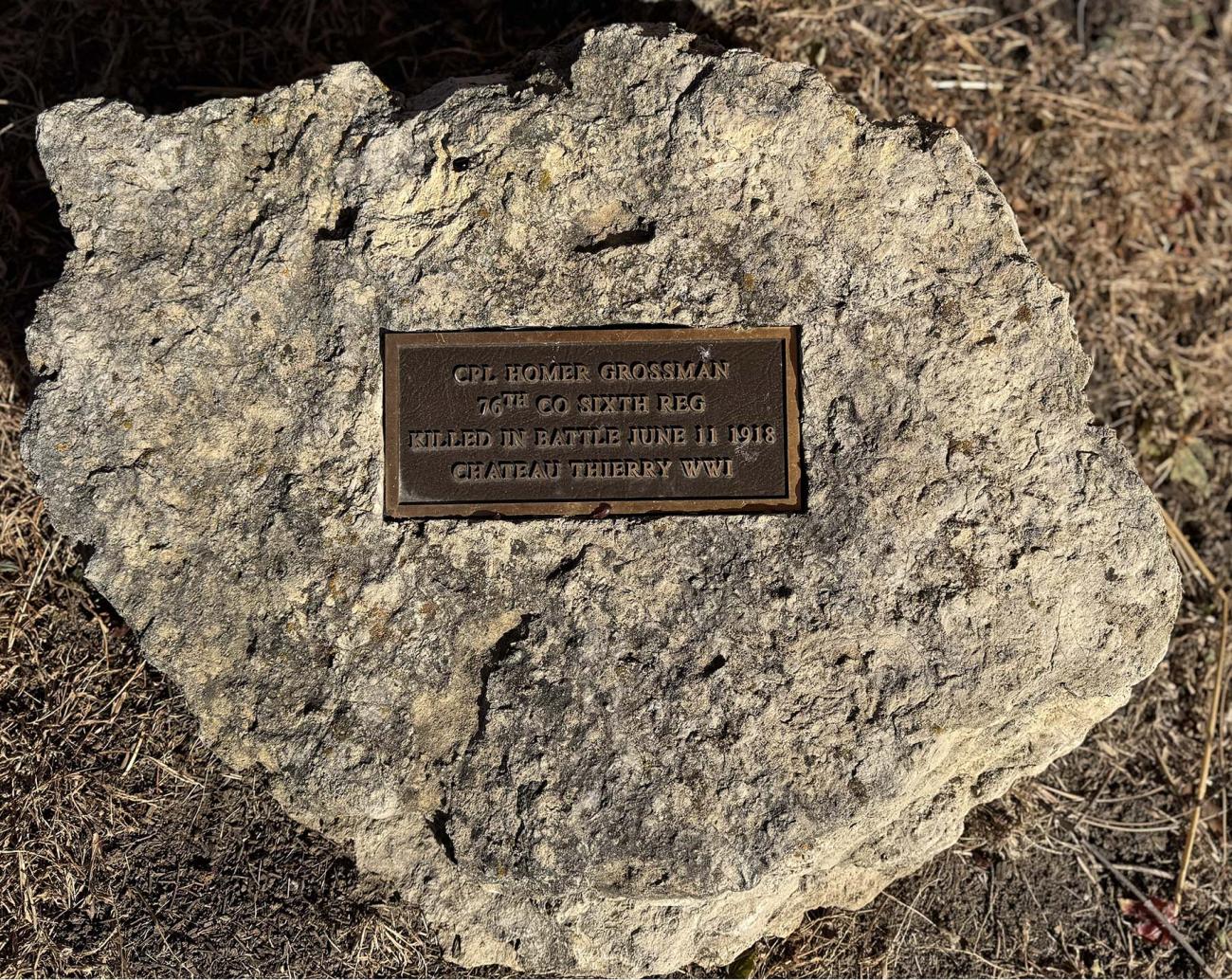 Rock with mounted plaque with CPL Homer Grossman, 76th CO Sixth Reg, Killed in Battle June 11 1918, Chateau Thierry WW1