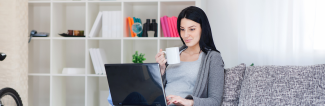 Woman studying on laptop