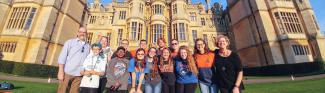 Group of people standing in front of Castle