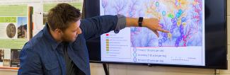 UW-Platteville student showing geographic info using technology