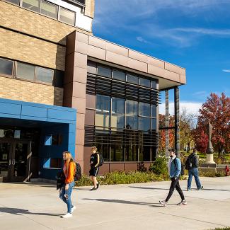 students walking across campus