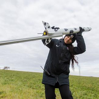 student launching a rocket