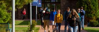 Baraboo sauk county students walking on campus in fall