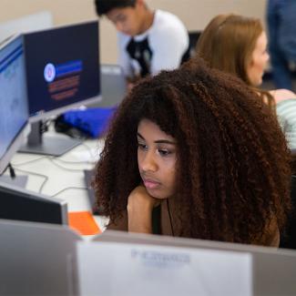 student at a computer
