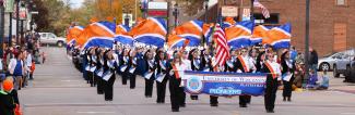 Marching Pioneers performing in Homecoming parade