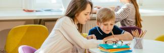 Pre-Social Worker helping child