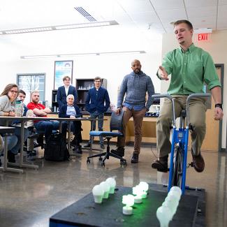 Students presenting sustainability research 