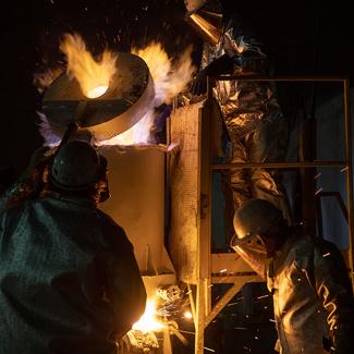 students working with metals