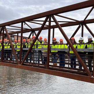 A large group of UW-Platteville's CMA students on a bridge