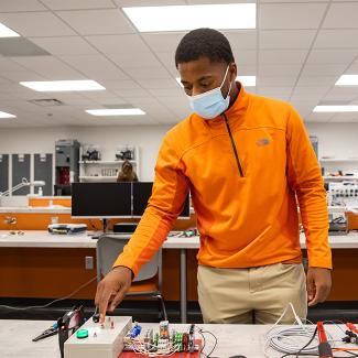 student in automation lab