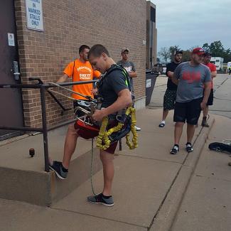 CMA student doing harness demo