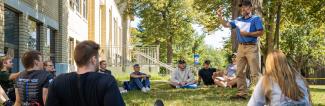 Class sitting outside