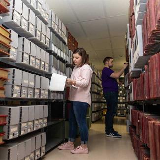 students researching in archives