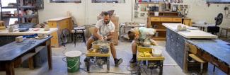 Students working on ceramics