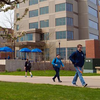 students walking on campus