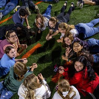 UW-Platteville students sitting in circle