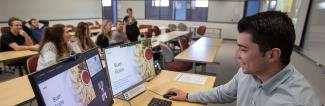 A UW-Platteville business student delivering a presentation