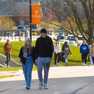 students walking across campus