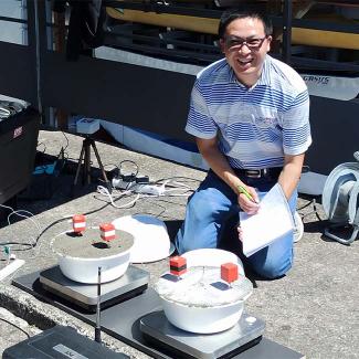 Dr. Danny Xiao, associate professor at UW-Platteville conducting concrete testing