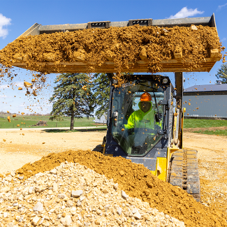 Student working equipment at Commercial Construction Lab