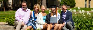 UW-Platteville graduate with family at commencement