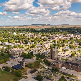 aerial photo of Platteville with campus in foreground and M in background