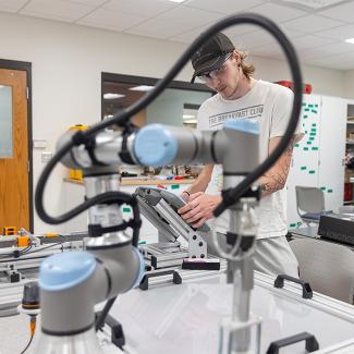 UW-Platteville student in Industrial Controls System lab