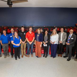UW-Platteville leadership pose in front of Milwaukee Tool donation.